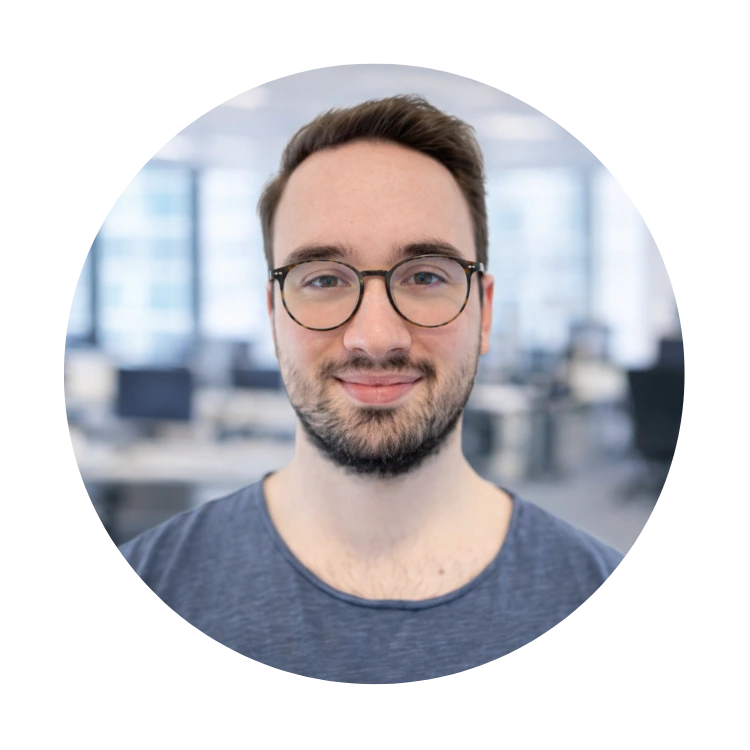 Rundes Portraitfoto von Tobias Wolf, Softwareentwicklung bei DIAWA